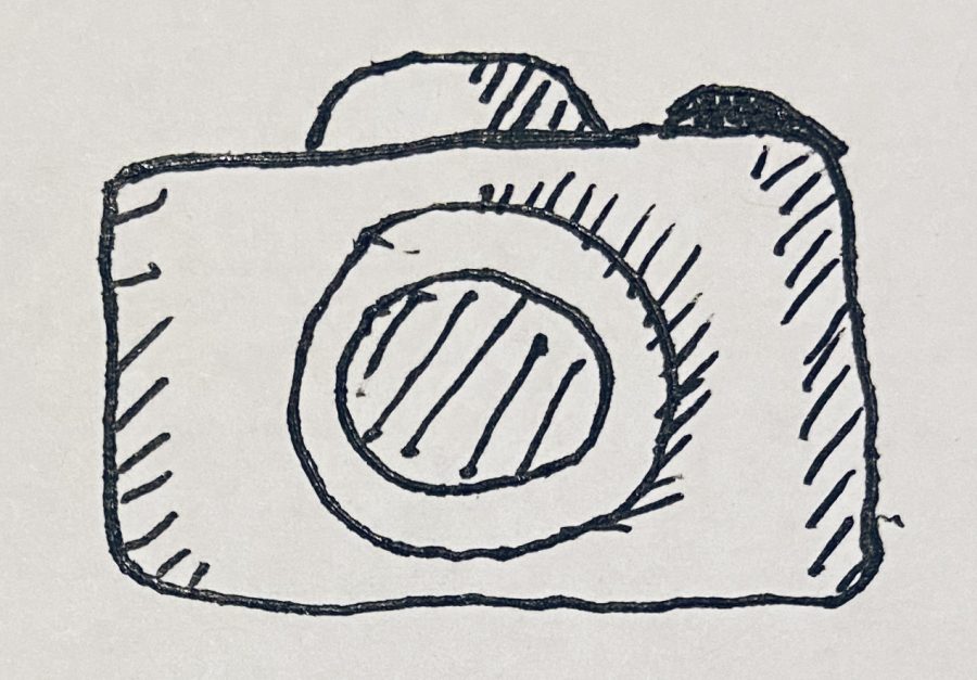 EIC Katie Jains drawing of a camera because Art.