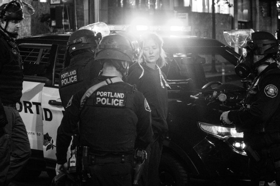 Protester getting arrested during the Black Lives Matter protest in Portland, Oregon. (Photo/Tito Texidor III/ Unsplash)