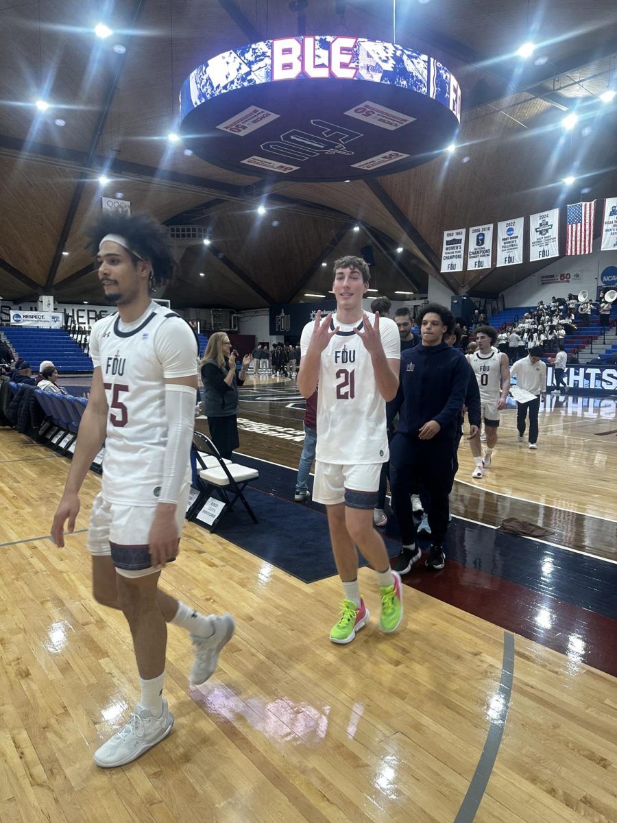 Hackensack, NJ — FDU players exit the court following a hard-fought 66–59 victory over Saint Francis at the Bogota Savings Bank Center.